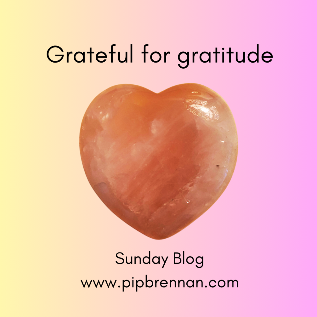 Grateful for gratitude - rose quartz gemstone on pink background to illustrate Sunday Blog 149 on pipbrennan.com