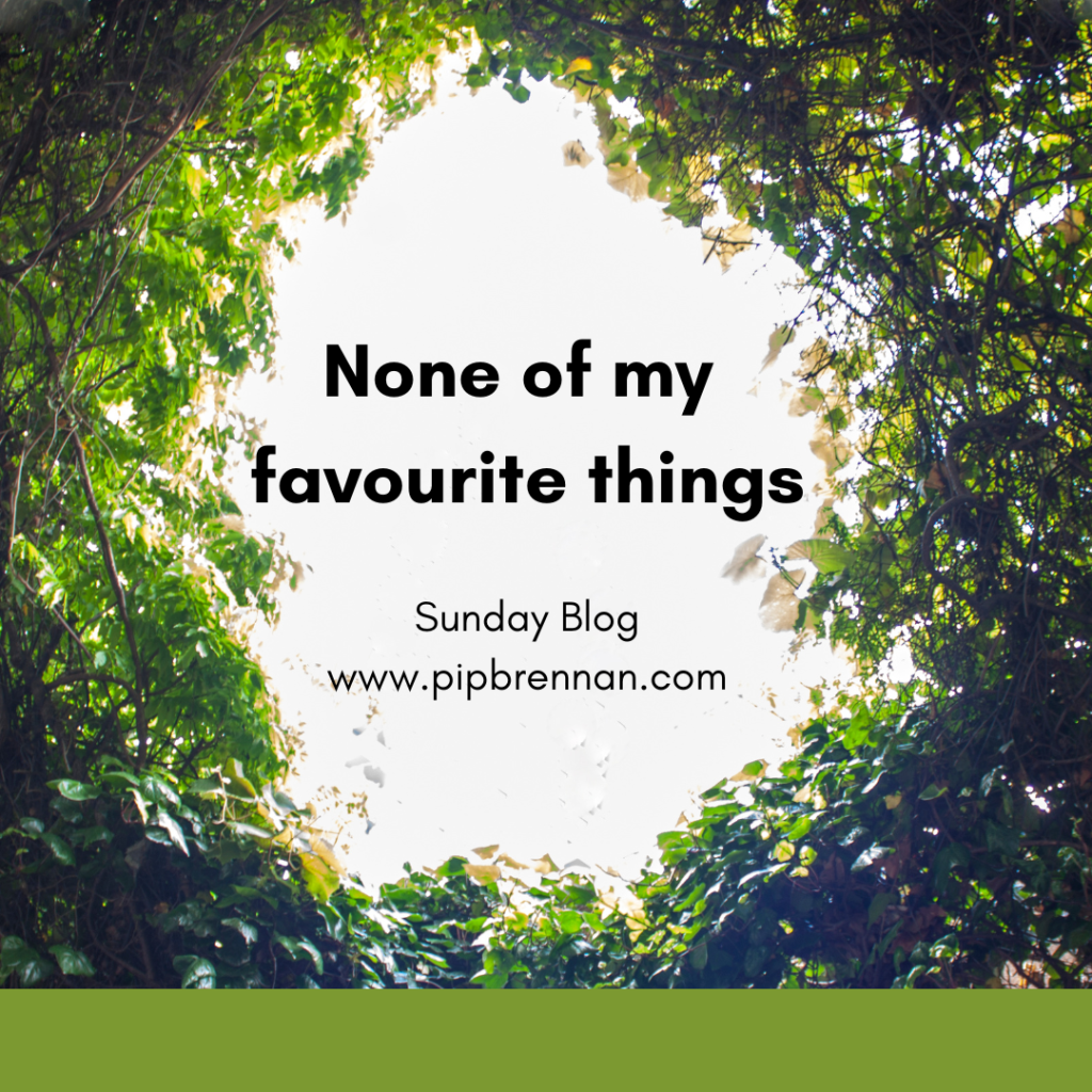 Picture from the bottom of a hole, looking at an ivy covered aperture to the sky, 